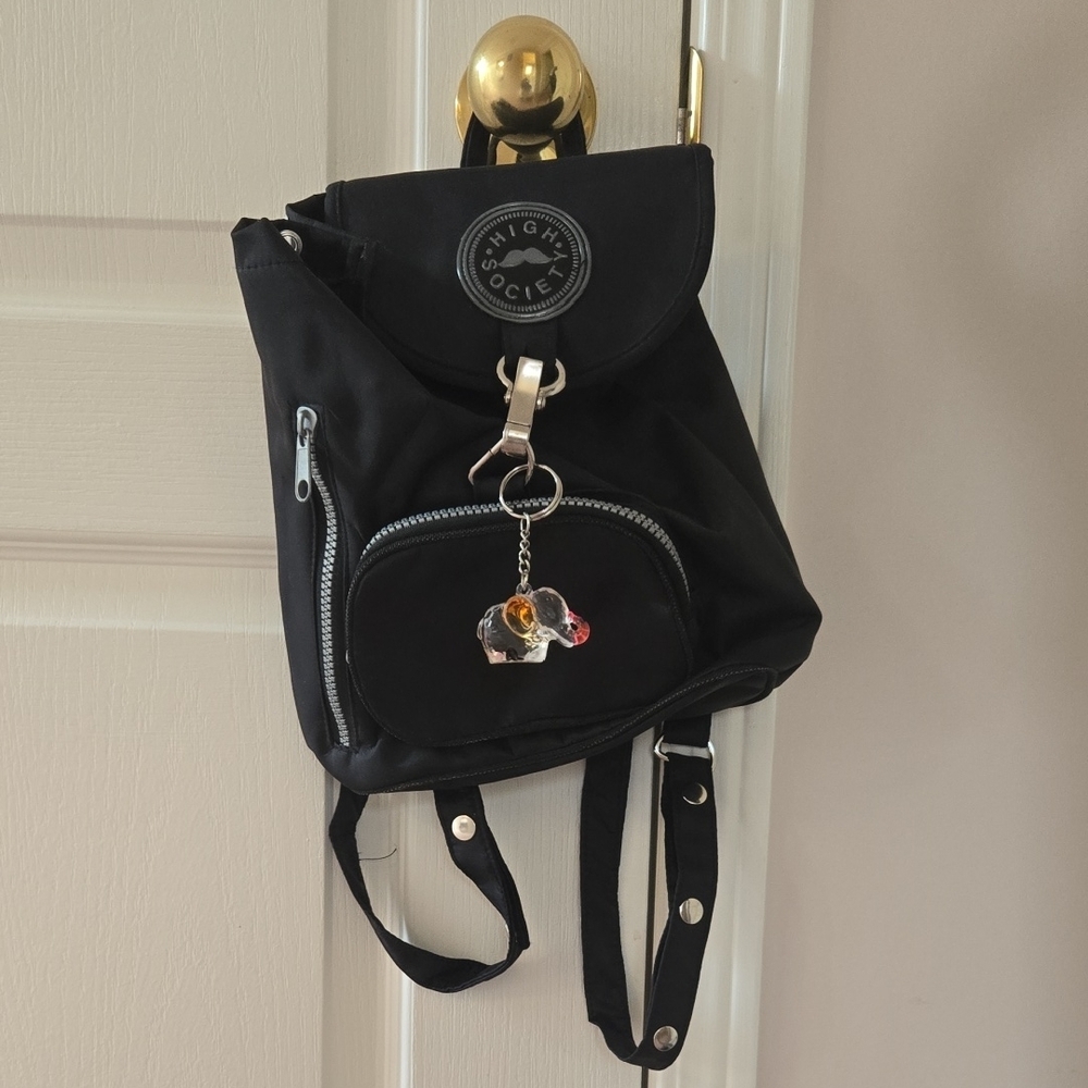 Sleek Black Nylon Mini Backpack Purse with Flap-Over Design